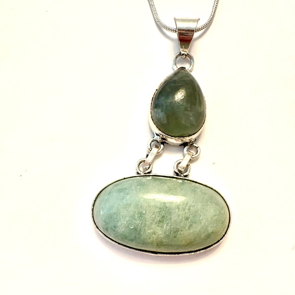 Beautiful, 2 inch, 2 stone, Aquamarine pendant on a silver chain.